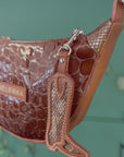Echo Sling: Patent Brown Croc Print